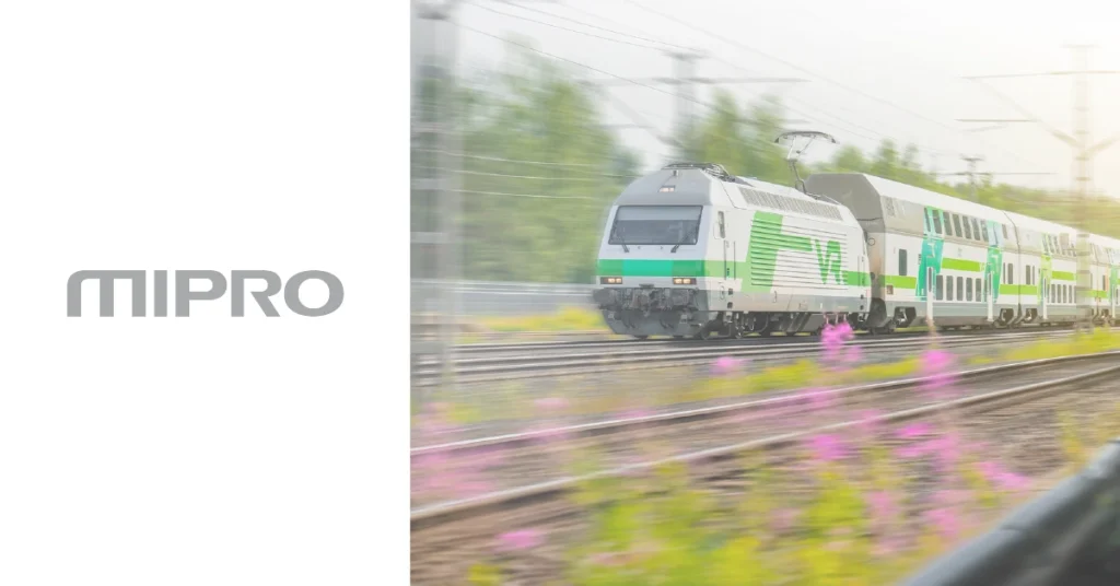 Mipro Railway Automation System - Prosys OPC - Prosys OPC Mipro train control system in operation on a Finnish commuter train traveling along railway tracks.